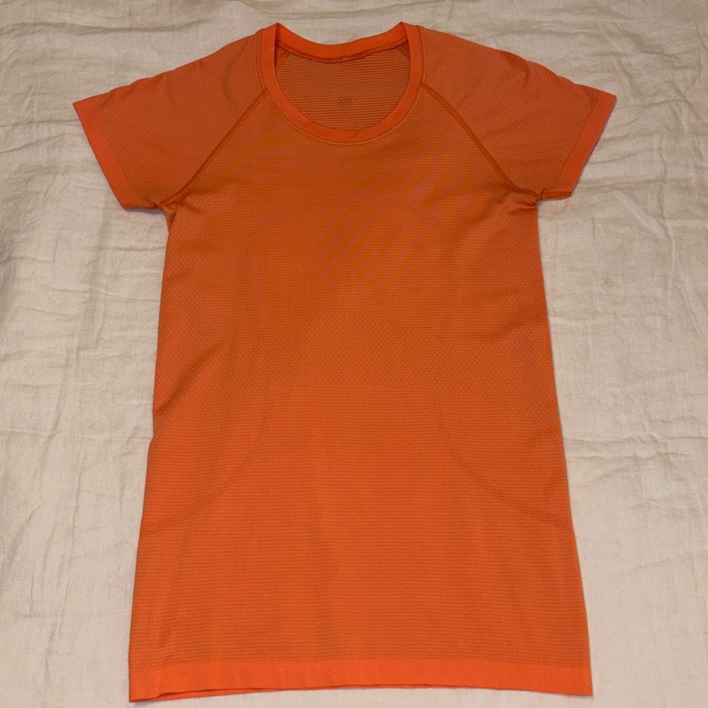Bright Orange Swiftly Tech
